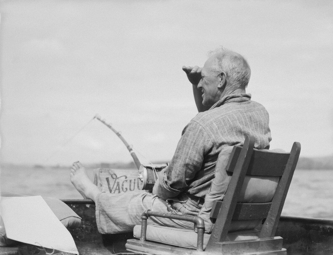old man reading letters