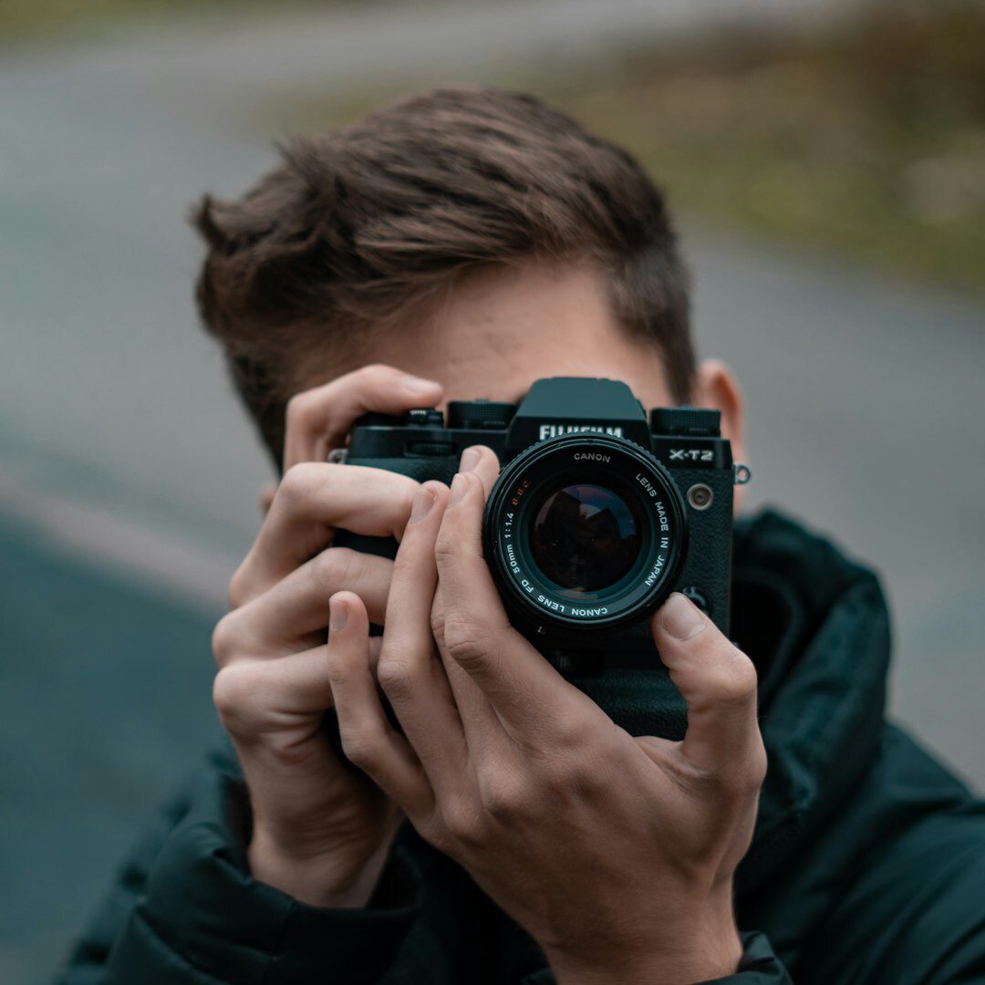 documentary photographer with camera